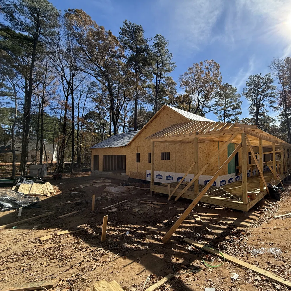 New home construction project with framing in gwinnett