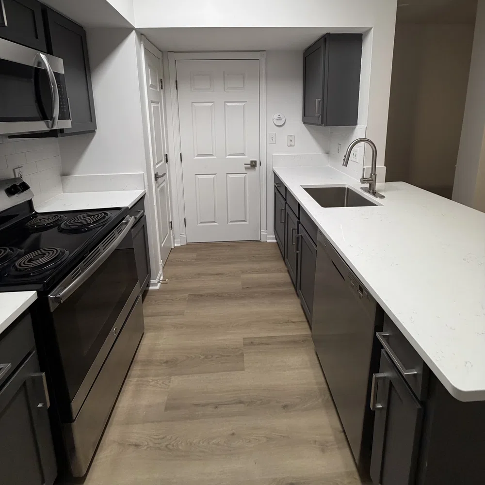 Skilled crew performing Remodeling & Renovations inside a dated Georgia home with updated finish plans